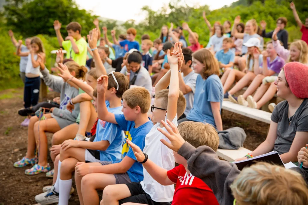 Campers gathered at campfire