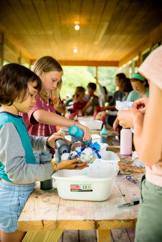 Campers working on crafts