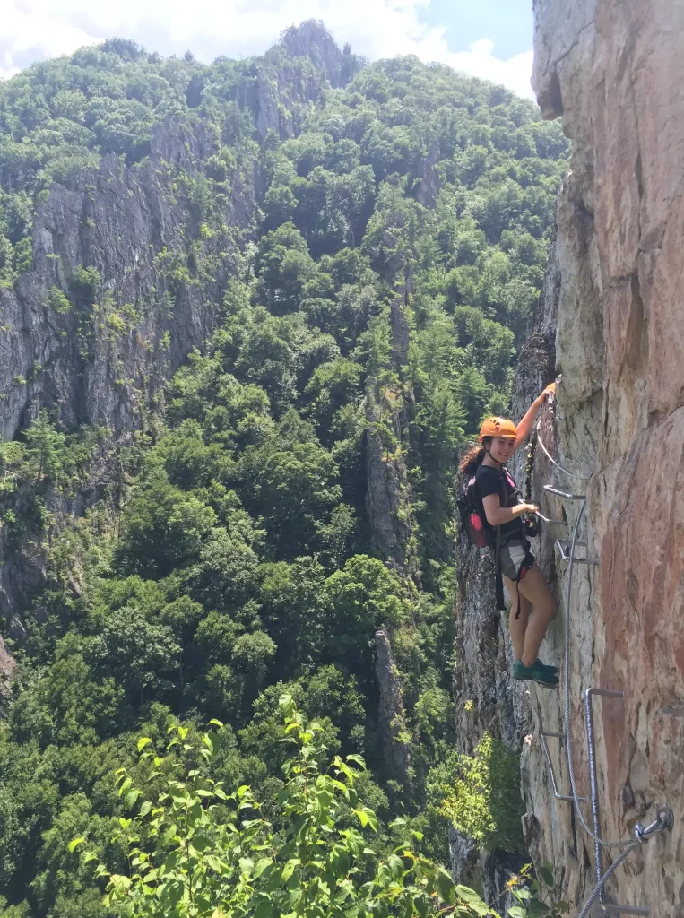 camper rock climbing